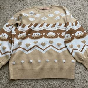 Jeana draws Tan Lakko Sweater